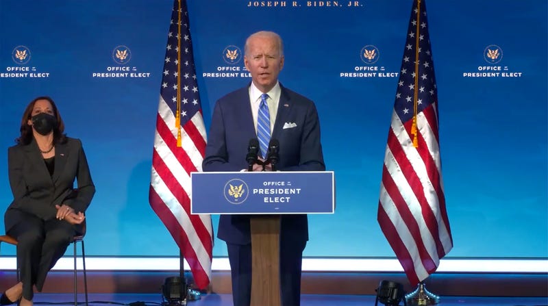 United States President-elect Joe Biden makes remarks “on the Public Health and Economic Crises” from the Queen Theatre in Wilmington, Delaware on Thursday, January 14, 2021. Looking on at left is US Vice President-elect Kamala Harris. Credit: Biden Transition TV via CNP/Sipa USA