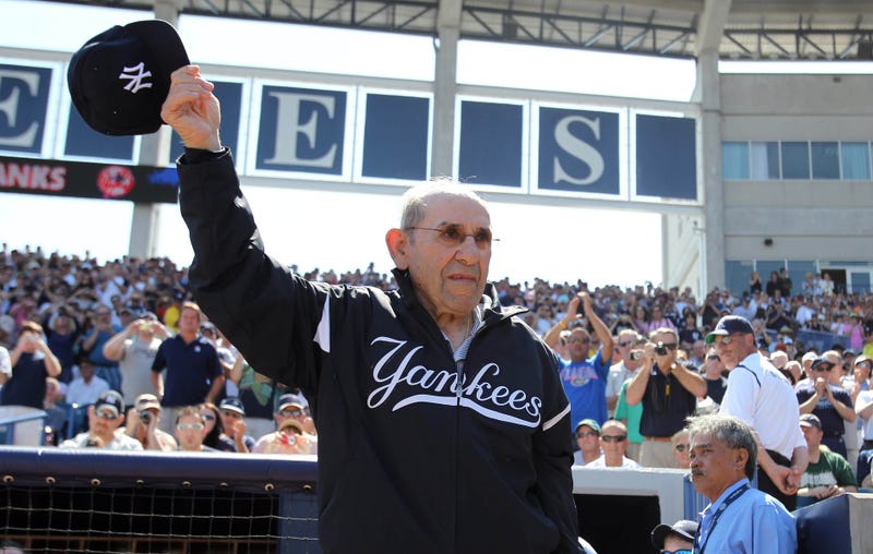 Baseball Hall of Famer Yogi Berra greets crowd