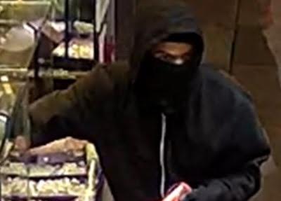 Police have said the prevalence of masks has made it more difficult for them to identify suspects like the man in this $1.1 million jewelry store heist in Flushing last week