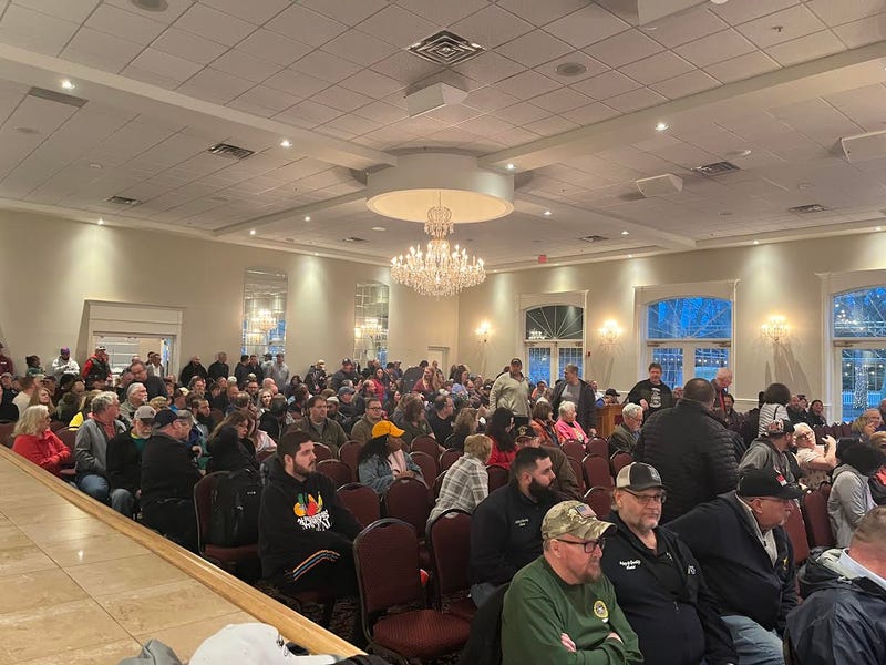 Some people were turned away as crowds of people came into the banquet hall on Union Road to hear the specifics of USPS's proposal to move distribution services from Buffalo to Rochester. (02/27/2024)