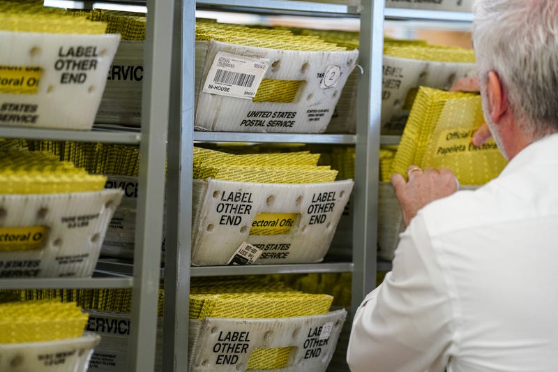 Workers sort mail ballots on Nov. 5, 2024, at Northampton County Courthouse in Easton, Pennsylvania.