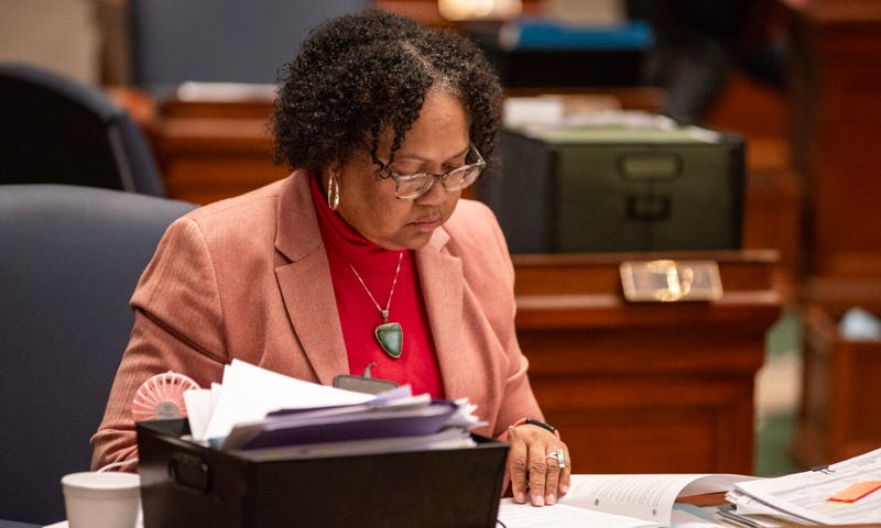 Sen. Barbara Washington, a Democrat from Kansas City, sits at her desk on the Missouri Senate floor. Washington has sponsored a bill banning hair discrimination for years in the Missouri State Legislature.