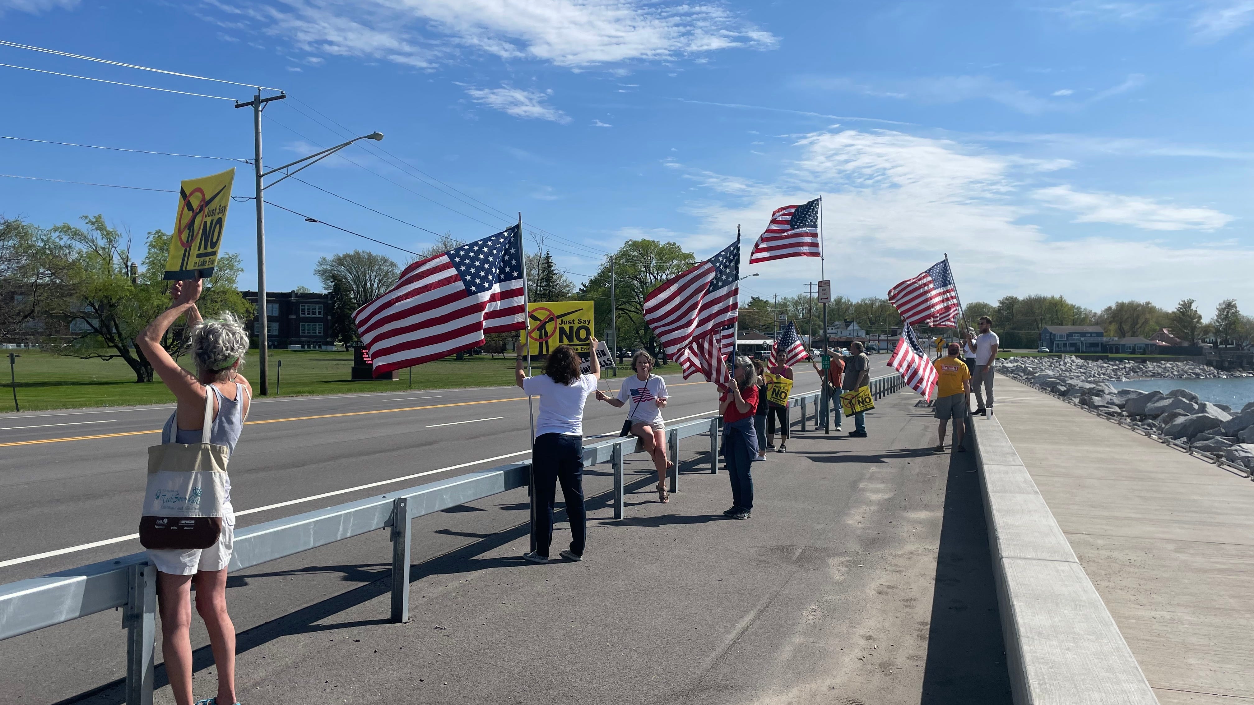 Protestors gather to fight against wind turbines in Lake Erie