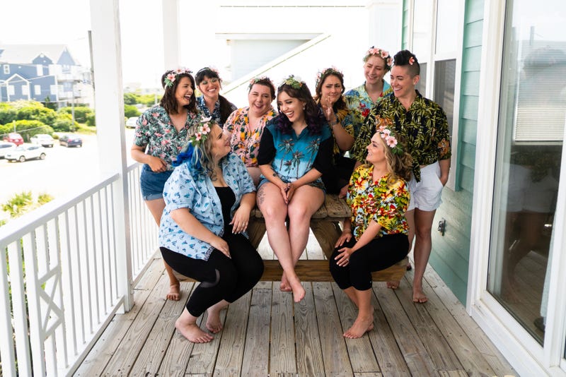 Alanna laughing with her bridal party