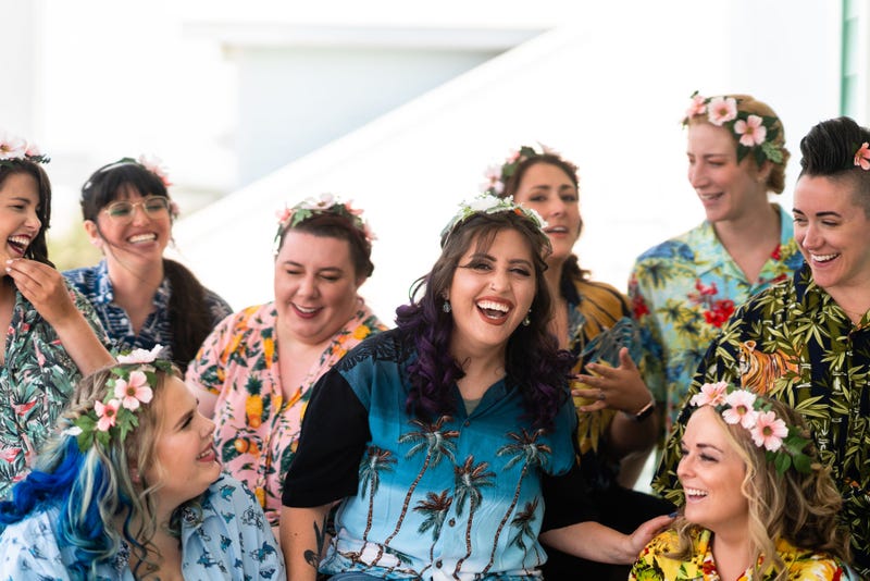 Alanna laughing with her bridal party