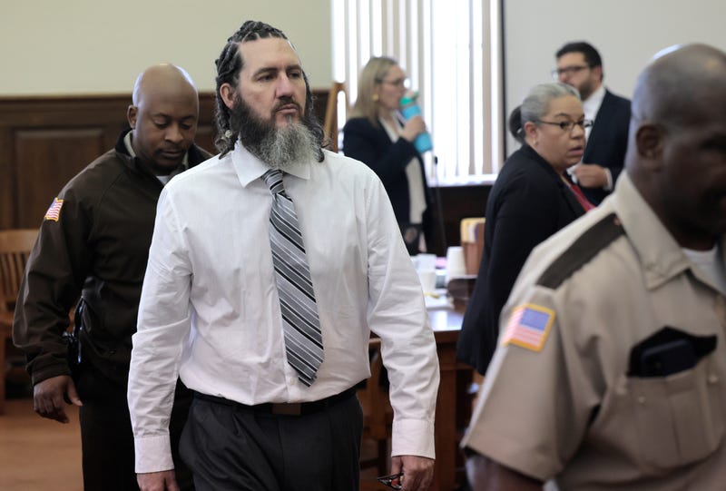 Thomas Kinworthy is escorted out of the courtroom during a murder trial where he's accused of killing a St. Louis City Police Officer back in 2020.