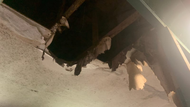 There are holes in the 30-year-old roof and the ceiling has caved in at spots.