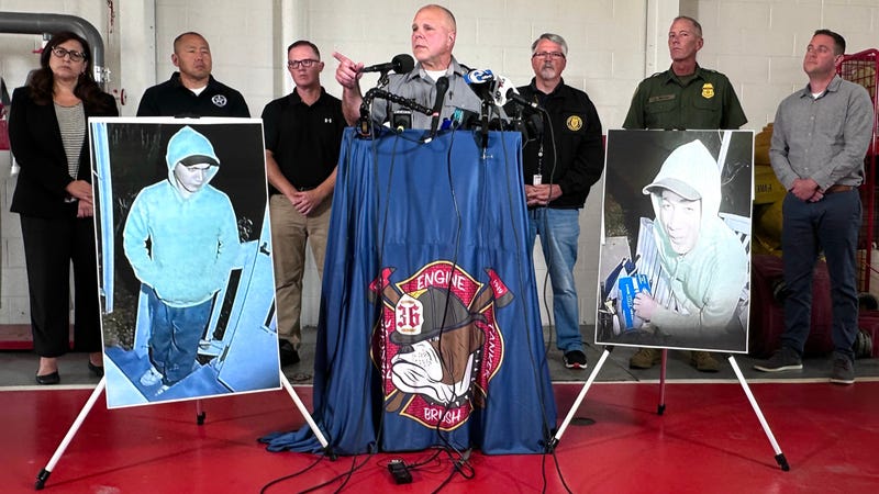 Flanked by photographs of escaped murderer Danilo Cavalcante, taken by a door camera the night before, Lt. Col. George Bivens of the Pennsylvania State Police briefs the media on Sept. 10, 2023, on developments in the manhunt.