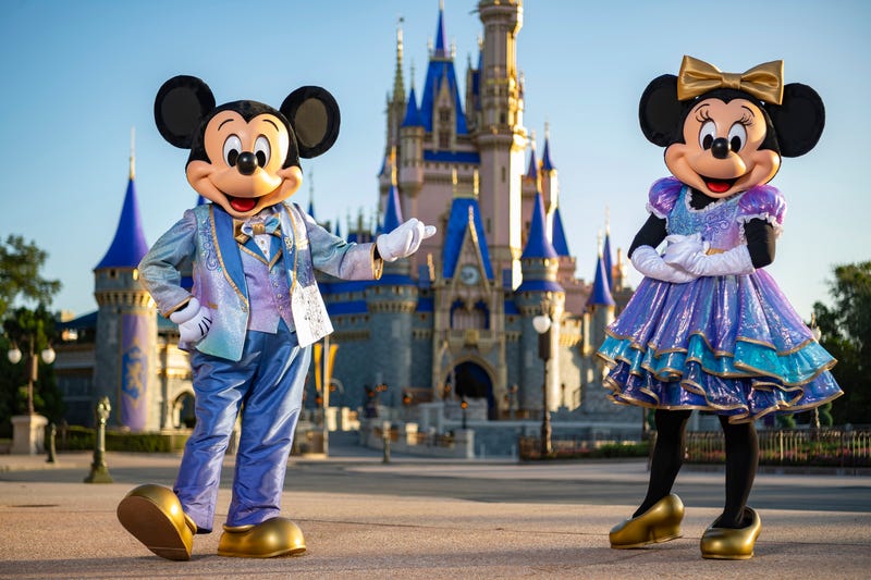 Mickey Mouse and Minnie Mouse in new outfits for Walt Disney World's 50th anniversary celebration