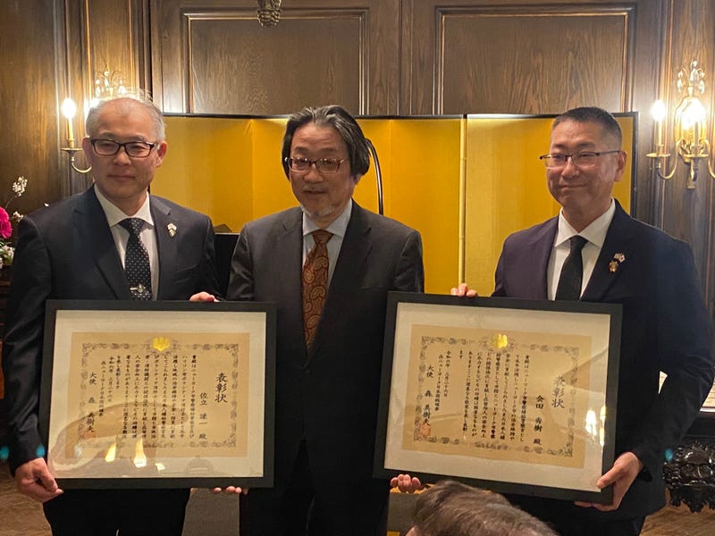 Consulate of Japan in New York ambassador Mikio Mori (center) is flanked by Kenichi Satate (left) and Hideki Aida (right) at Mori's Upper East Side residence on March 26, 2024.