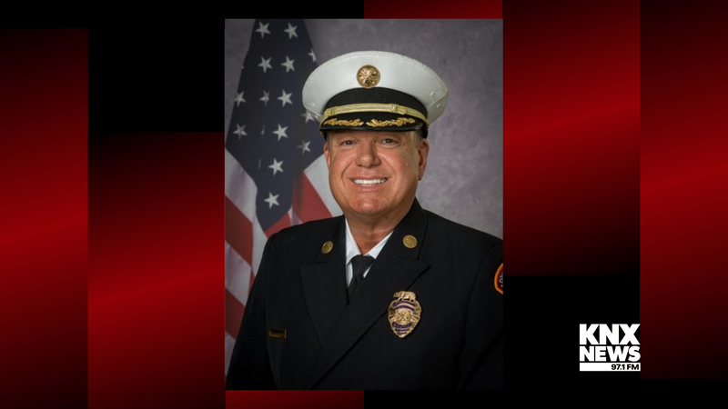 professional portrait of white man in fire captain uniform