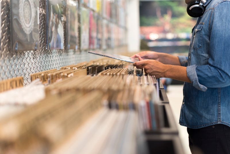 Shopper going through records