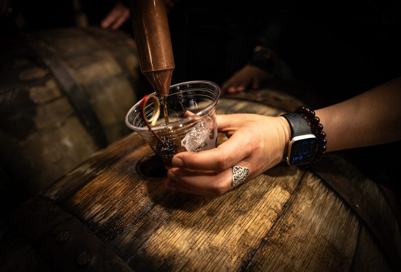 Whiskey being poured in glass
