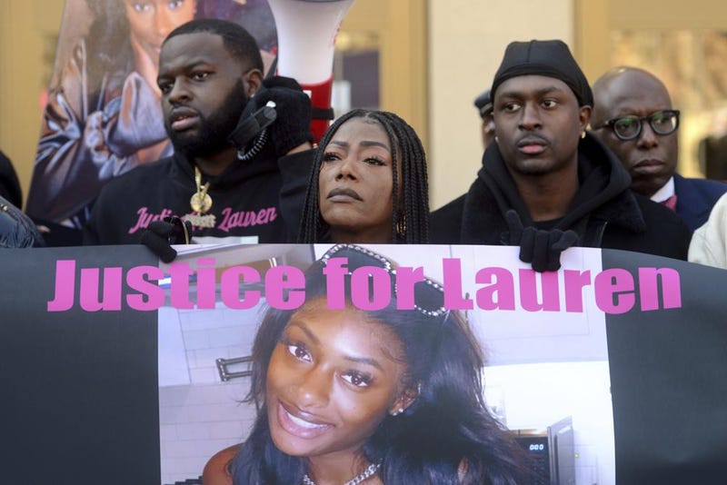 Shantell Fields, Lauren Smith-Fields' mother, stands with family members during a protest rally in front of the Morton Government Center, in Bridgeport, Conn. Jan. 23, 2022