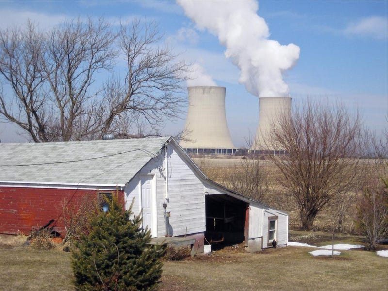 FILE - In this March 16, 2011 file photo, steam escapes from Exelon Corp.'s nuclear plant in Byron, Ill. A massive energy policy overhaul aimed at making Illinois a fully renewable-energy state by 2050 cleared the Senate early Wednesday, Sept. 1, 2021 despite objections from Gov. J.B. Pritzker and groups who want more environmental and consumer protections.
