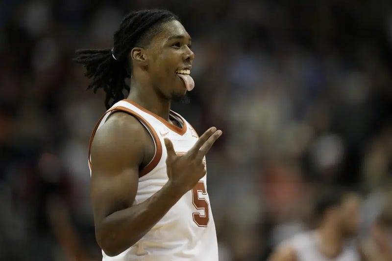 Texas guard Marcus Carr celebrates after scoring against Xavier in the first half of a Sweet 16 college basketball game in the Midwest Regional of the NCAA Tournament Friday, March 24, 2023, in Kansas City, Mo