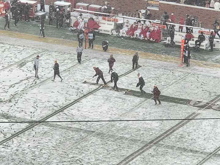 Shovel crews at Huntington Bank Stadium