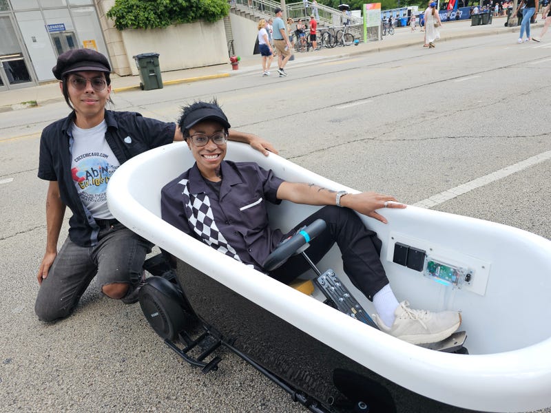 Cabinet of Curiosities has designed a 'Bathmobile' that can be seen making circles along Monroe St, between Michigan Avenue and Columbus near the entrance to the free and family friendly NASCAR Village.