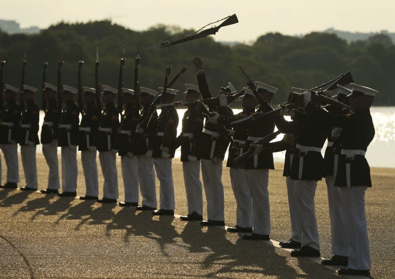 Marines with the U.S. Marine Corps Silent Drill Platoon execute their “long line” sequence.