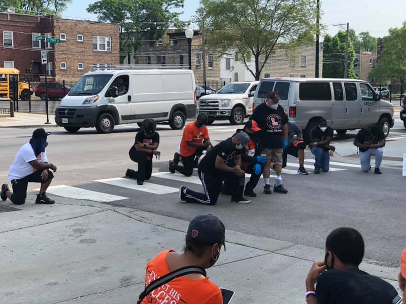 Students from Leo Catholic High School in the Auburn-Gresham neighborhood on Chicago’s South Side cleaned up 79th Street on Thursday, following several days of property damage and looting.  