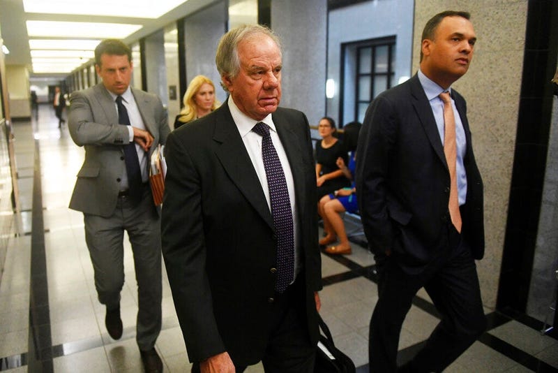 Attorneys Jack Goldberger, center, Alex Spiro, left, and William Burck, the defense team for New England Patriots owner Robert Kraft, make their way to Courtroom 2E at the Palm Beach County Courthouse, Friday, April 12, 2019, in West Palm Beach, Fla., for
