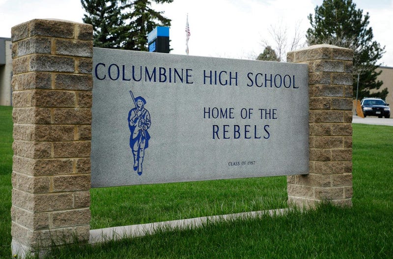A patrol car is parked in front of Columbine High School, Wednesday, April 17, 2019