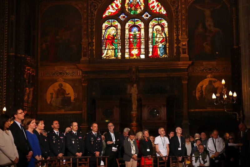 Faithfuls attend a Sunday Mass at the grandiose Saint-Eustache church on the Right Bank of the Seine river in Paris, Sunday, April 21, 2019. The archbishop of Paris and Catholics from around France and the world honored the firefighters who saved Notre Da