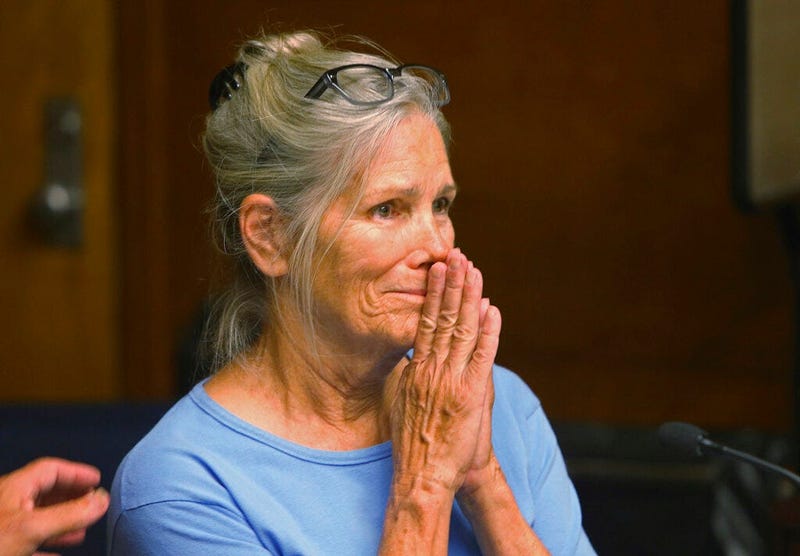 Leslie Van Houten reacts after hearing she is eligible for parole