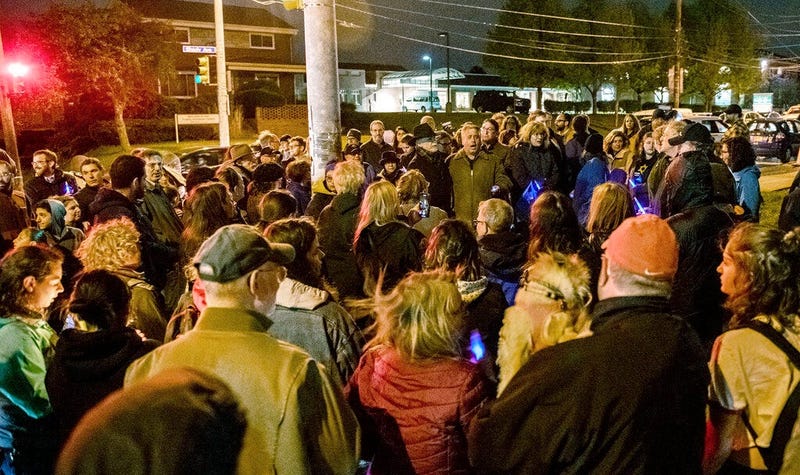 Mourners sing during the six-month anniversary of the Tree of Life synagogue shooting at a vigil Saturday, April 27, 2019, in Pittsburgh. The Pittsburgh synagogue that six months ago was the site of the deadliest attack on Jews in U.S. history offered its