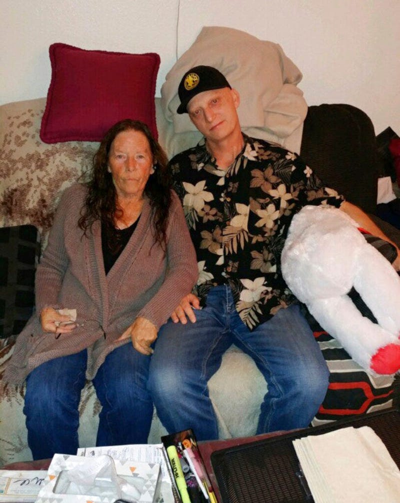 Michael R. White, right, is seen with his mother, Joanne White, left