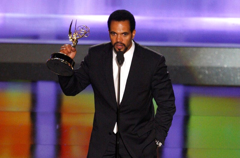 Kristoff St. John accepts the award for outstanding supporting actor in a drama series for his work on "The Young and the Restless" at the 35th Annual Daytime Emmy Awards in Los Angeles