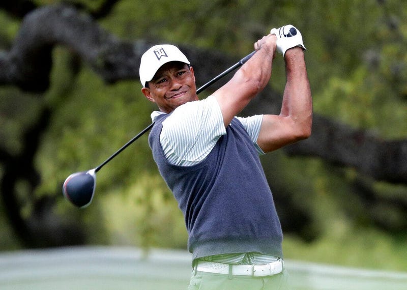 Tiger Woods watches his drive on the eighth hole during fourth round play at the Dell Technologies Match Play Championship golf tournament, Saturday, March 30, 2019, in Austin, Texas.