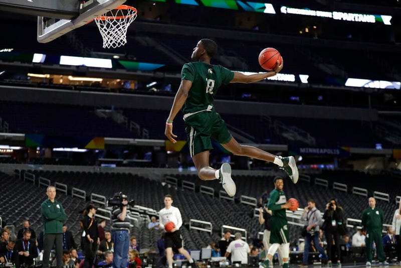 Michigan State forward Gabe Brown dunks the ball during a practice session for the semifinals of the Final Four NCAA college basketball tournament, Friday, April 5, 2019, in Minneapolis.