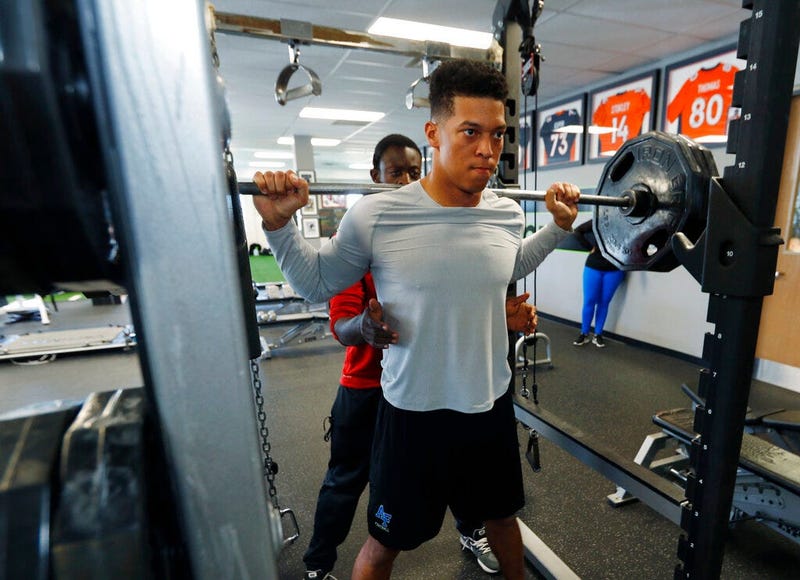 Air Force wide receiver Jalen Robinette takes part in a drill to prepare for the NFL Combine at a workout facility in Centennial, Colo. Two years after the U.S. Defense Department thwarted his plans of going straight from the Air Force Academy to the NFL,