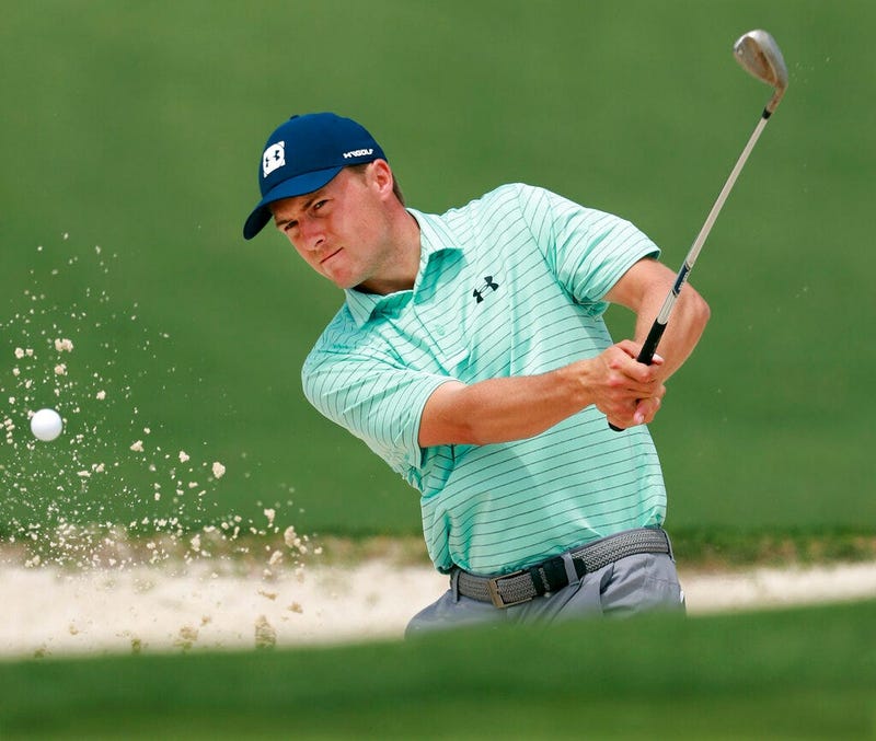 Jordan Spieth hits from the bunker to the second green during his practice round for the Masters at Augusta National Golf Club on Tuesday, April 9, 2019, in Augusta, Ga.