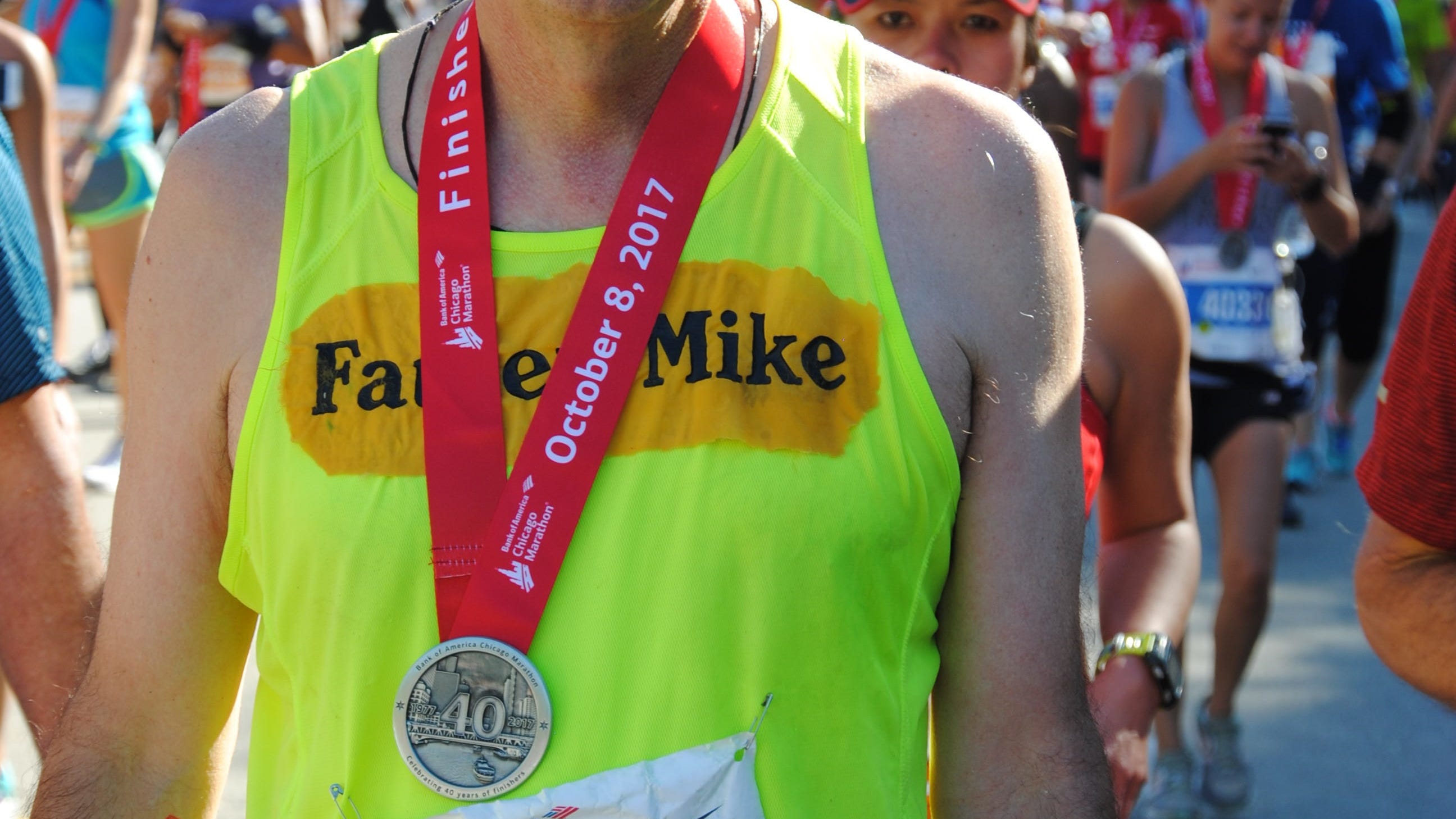 Priest to run his own 'Chicago' marathon for charity