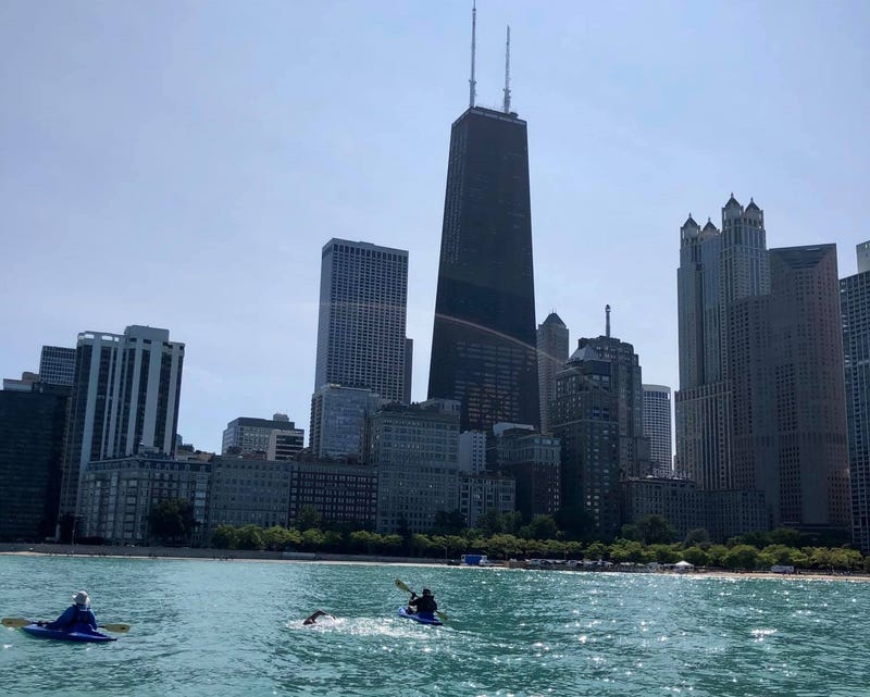 A swimmer participates in A Long Swim's open water swim in Lake Michigan.