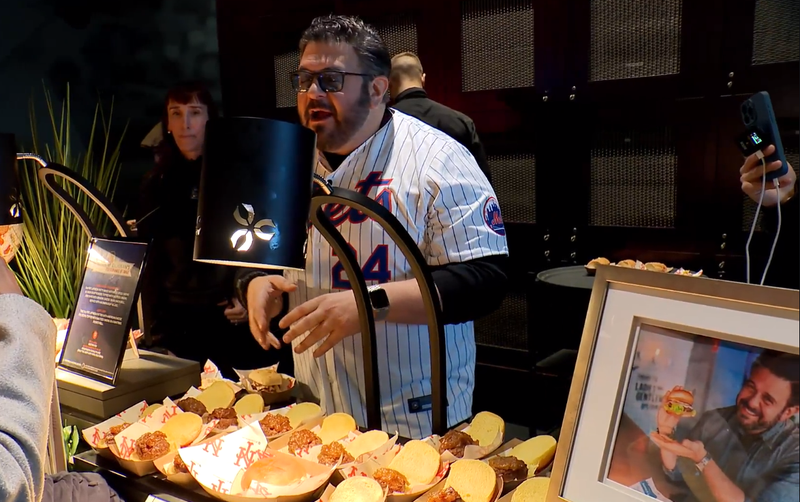 Adam Richman's Burger Hall of Fame brought its famous French Onion Soup Burger, made with a Pat LaFrieda patty, and his Jucy Lucy burger to the March 21, 2024 event.