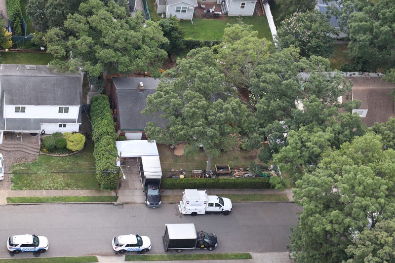There appeared to be less activity overall compared to last week, when dozens of police were seen in the front yard