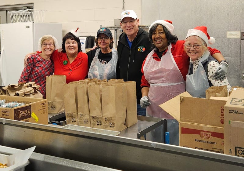 Rick Ellis and volunteers preparing meals at Amherst Meals on Wheels, John James Audubon Parkway
