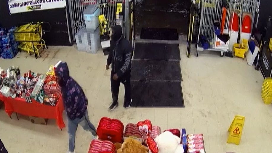 Police release video of two suspects wanted in connection with armed robbery at Dollar General [WATCH]