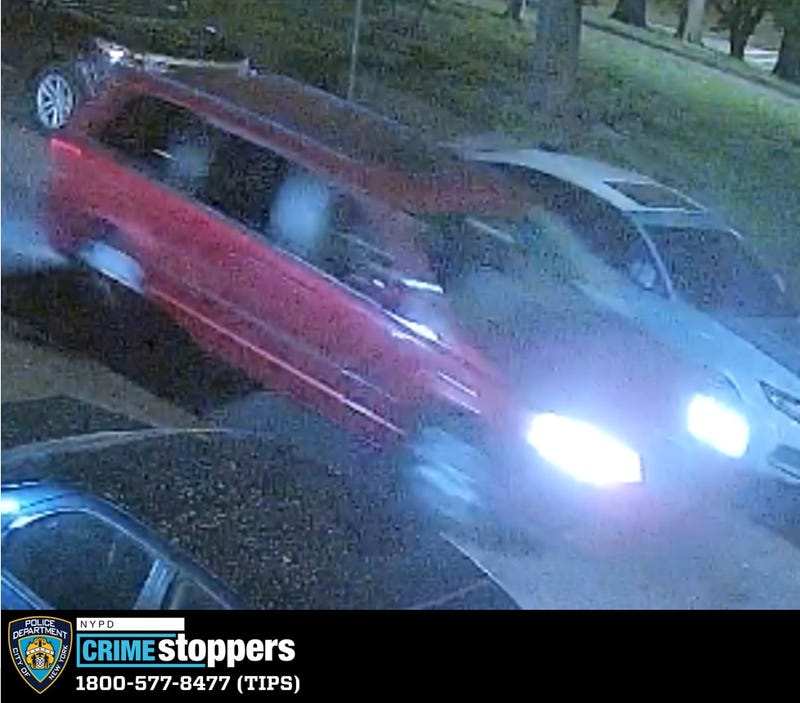 The suspects fled the Rego Park robbery in a red minivan, cops said