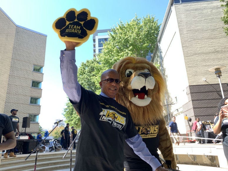 CCP President Dr. Donald "Guy" Generals and the college's new mascot, Roary.