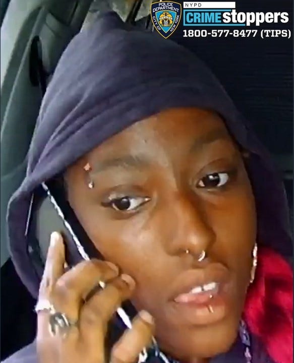 Woman wanted for beating a taxi driver during knifepoint robbery in Queens last month.
