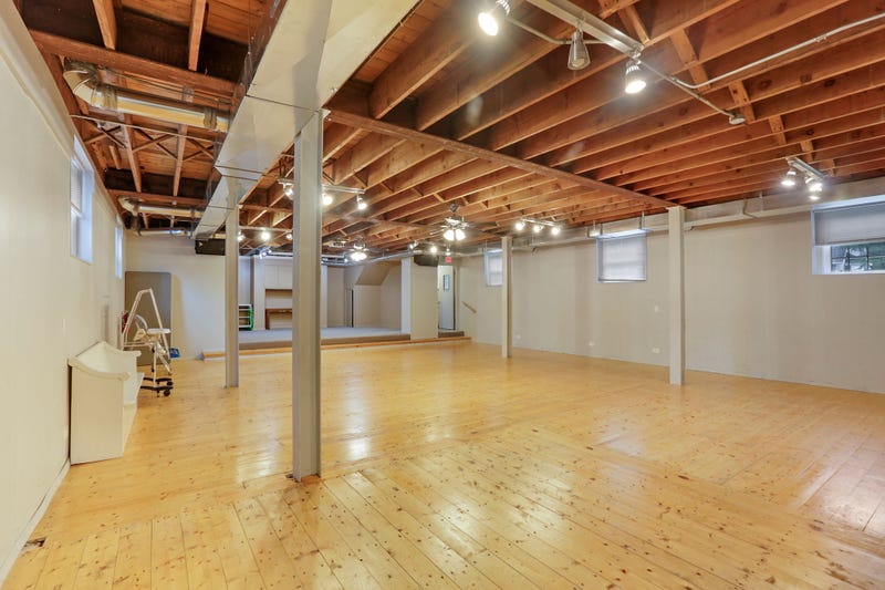 The nearly 4,000-square-foot space features large open rooms and a full, finished basement. "If you're looking for something that's a little different and a little project, it would be a phenomenal home," said real estate broker Daniel Gleason.