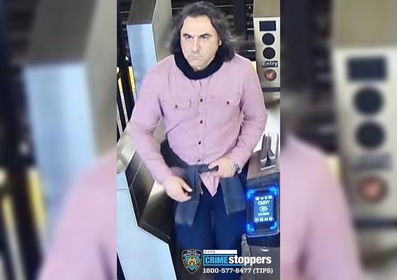 Police are looking to track down a suspect who grabbed a woman's bag at a Brooklyn subway station and told her he needed to search it for an "electronic tracking device"