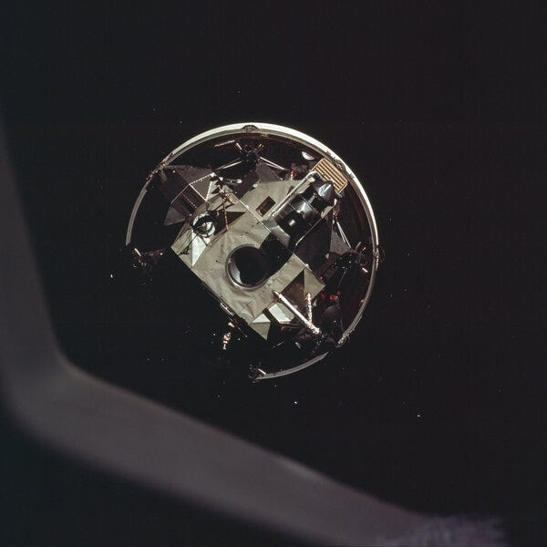 The Apollo 11 crew docks head-first with the moon landing module.