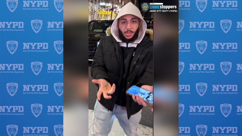 Man wanted in a violent robbery of two women following a car crash in Manhattan last month.