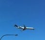 Plane flies overhead