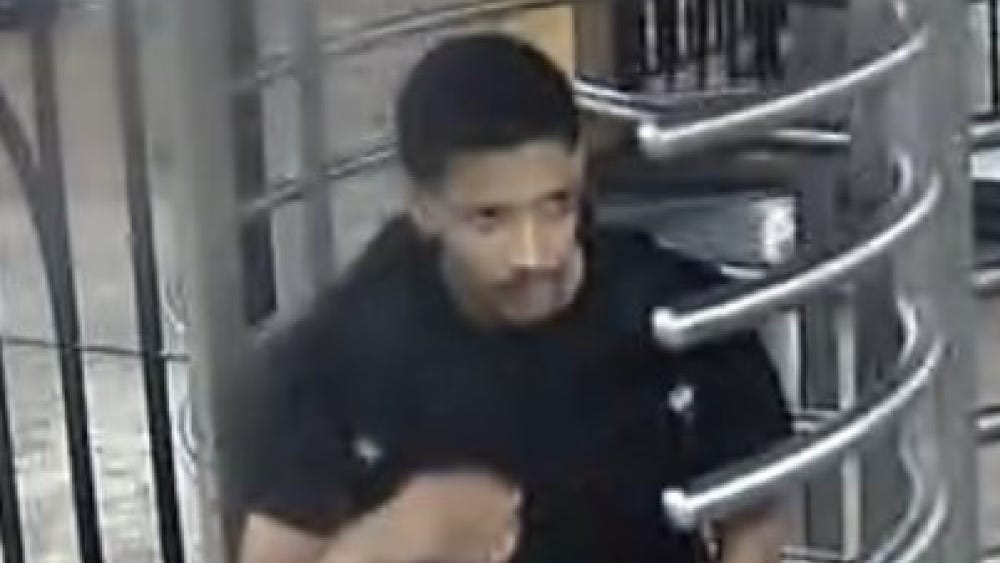 Woman placed in headlock, robbed on Queens subway platform in middle of day